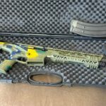 Espingarda de Bolsonaro apreendida pela PF é personalizada com as cores do Brasil